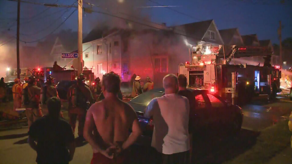 Bystanders watching a fire